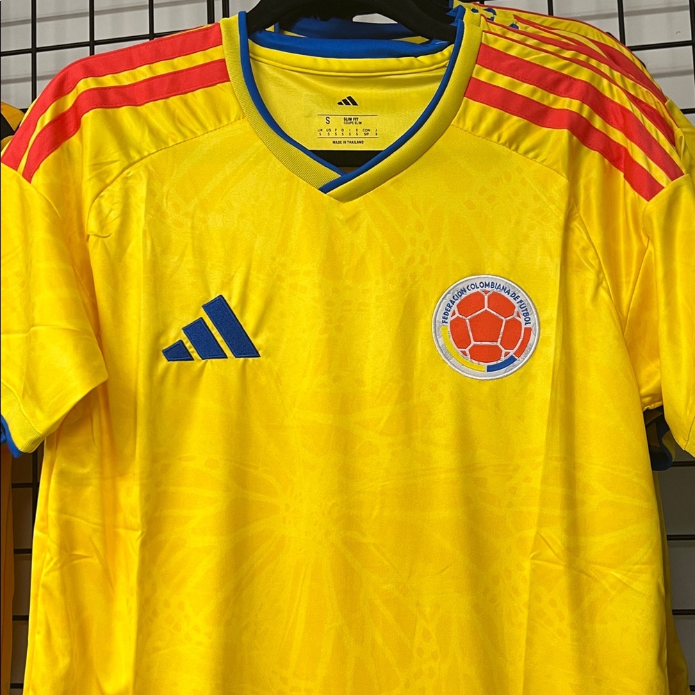 Adidas Yellow Jersey with Red and Blue Details